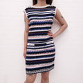 CHANEL BLUE, RED, CREAM AND BLACK TWEED SKIRT SET WITH LOGO DETAIL - SIZE 38