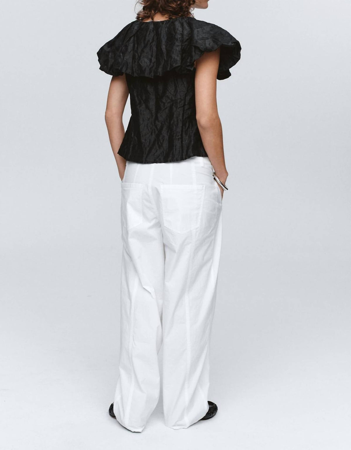 Andre Textured Ruffle Top In Black